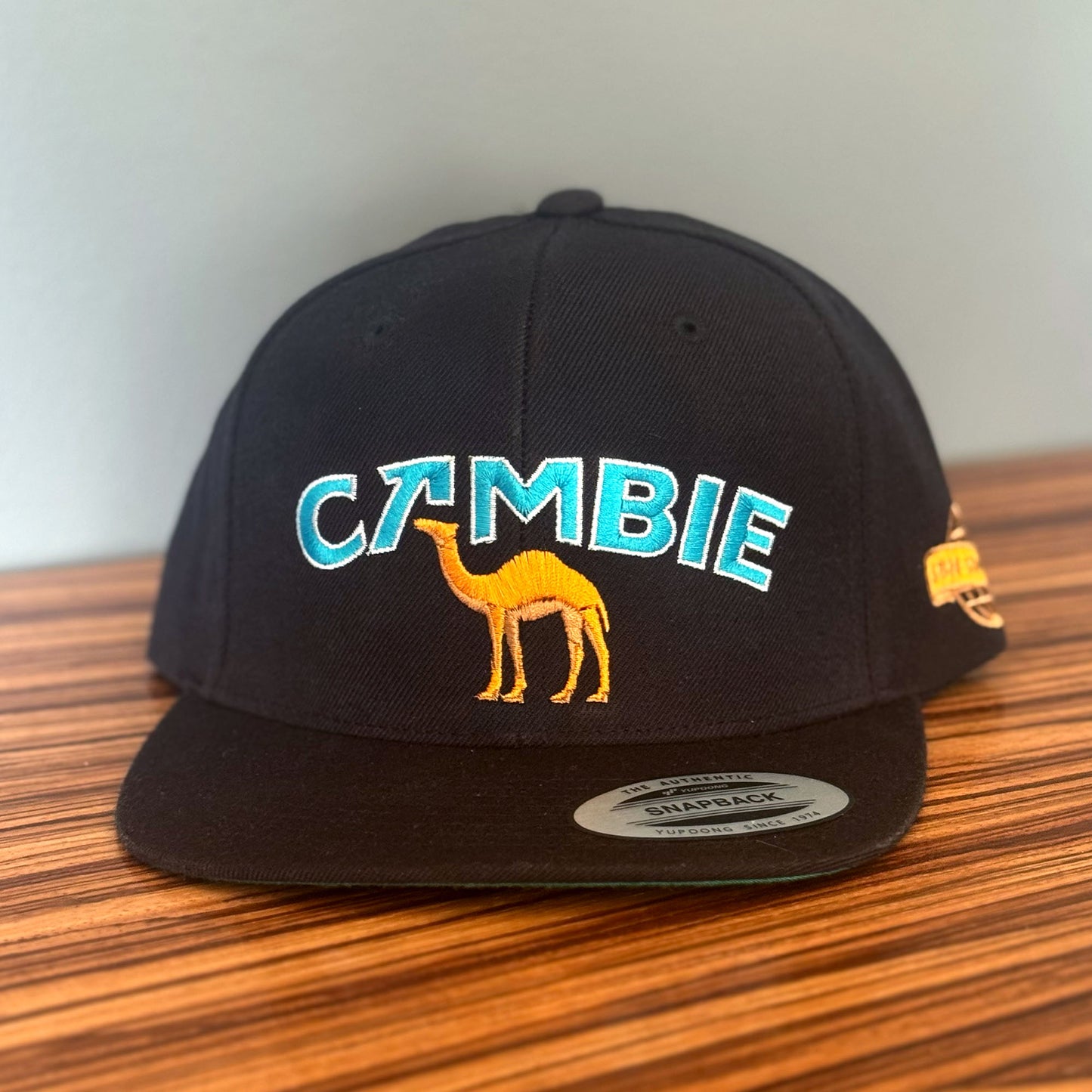Cambie Camel 5-Panel Snapback (Black)